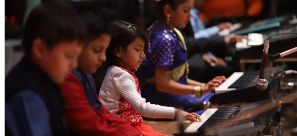 kids playing keyboard